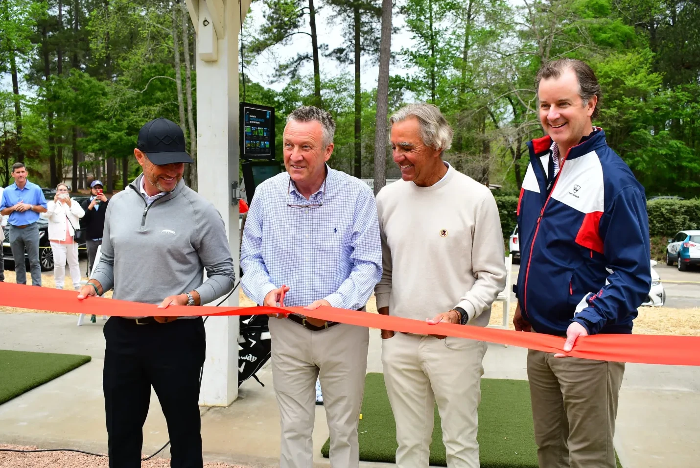 Ribbon-cutting at the reopening of The Practice Club at Jones Creek